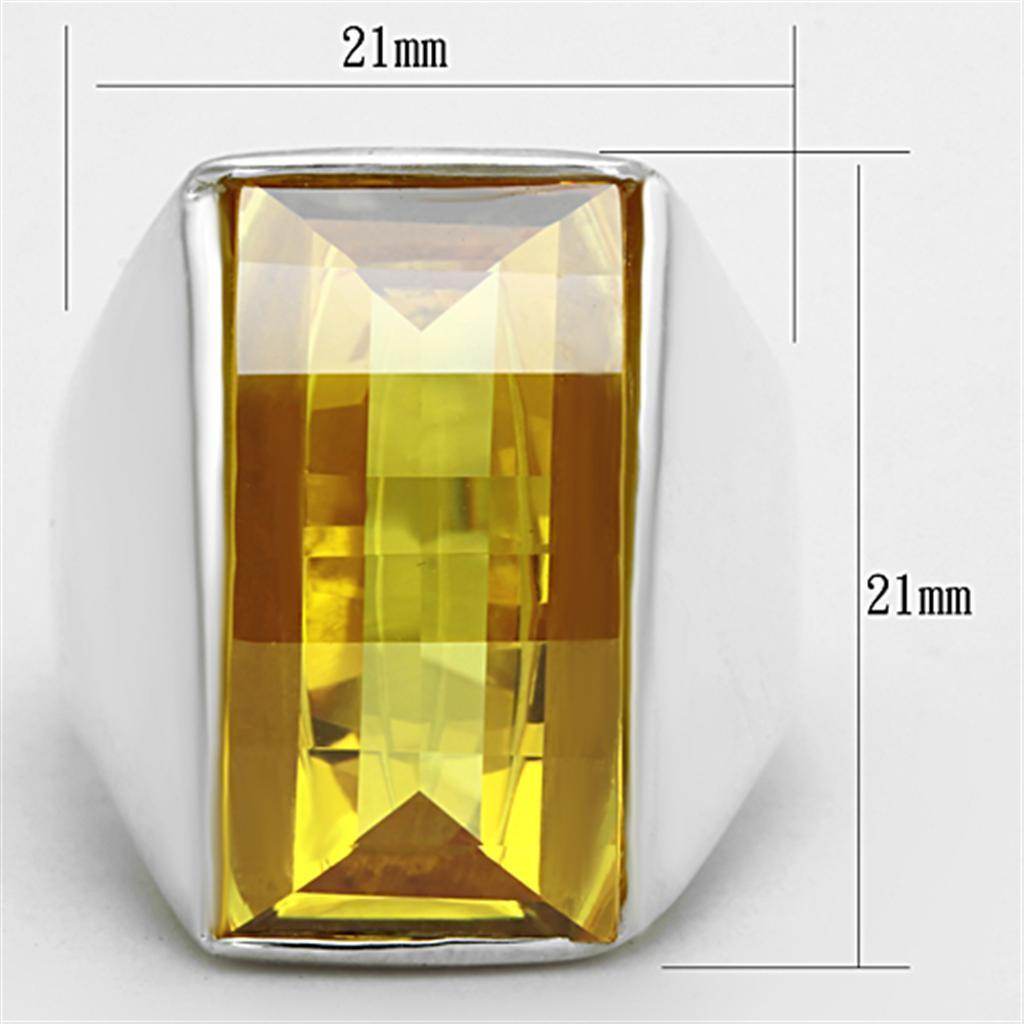 Stylish yellow gemstone cocktail ring with a large rectangular cut and silver band for elegant evening wear