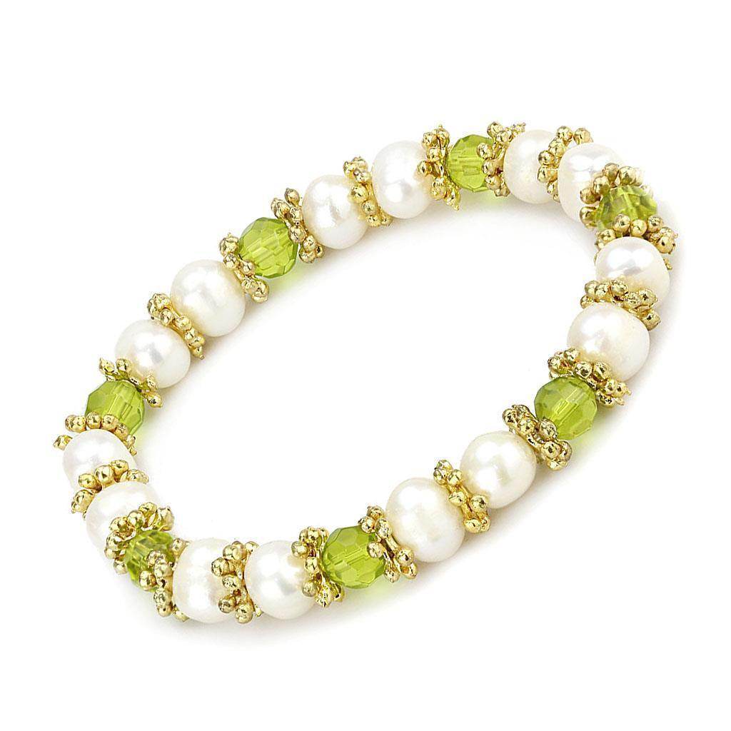 Unique antique silver women's bracelet adorned with pearls and green gemstones