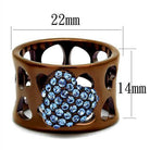 Aquamarine crystal ring in a brown metal setting with heart-shaped embellishments
