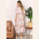 Trendsi women's balloon sleeve vacation dress with a stylish geometric pattern and relaxed fit