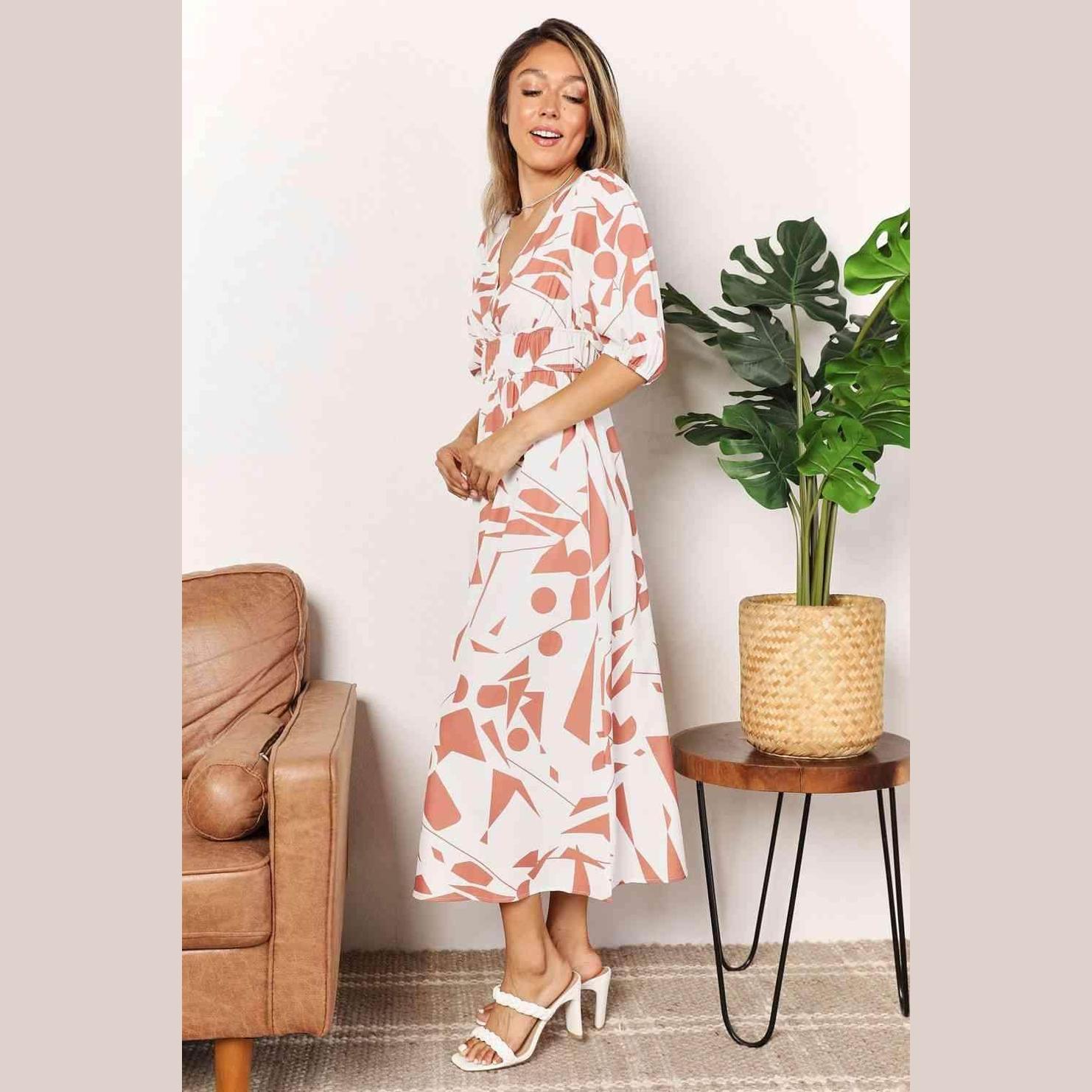 Trendsi balloon sleeve vacation dress in a stylish geometric print, perfect for summer outings