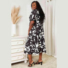 Trendsi women's balloon sleeve vacation dress with a chic abstract print, perfect for stylish summer outings