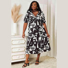 Trendsi women's balloon sleeve vacation dress in black and white geometric print, perfect for warm weather outings