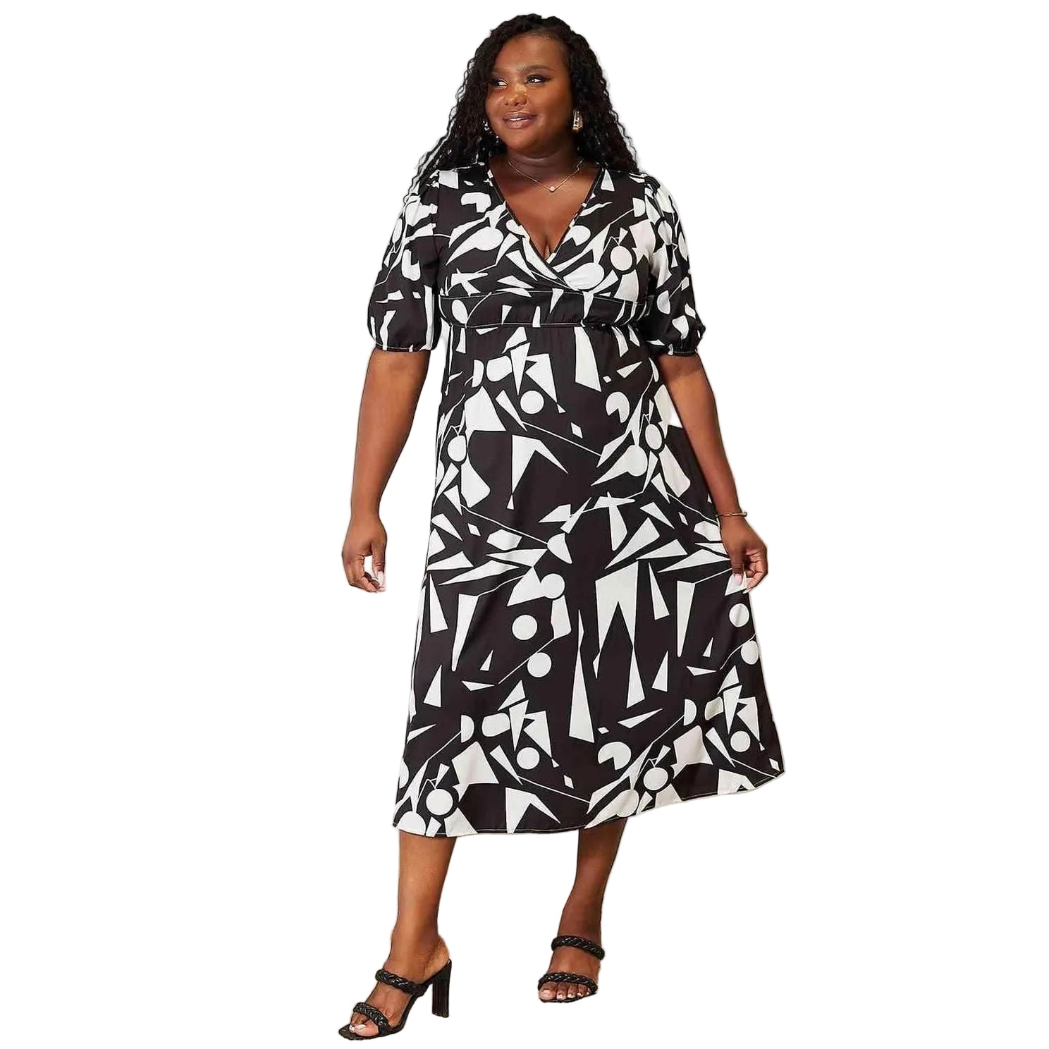 Trendsi women's balloon sleeve vacation dress in black and white geometric print, perfect for warm weather outings