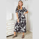 Trendsi balloon sleeve vacation dress featuring a geometric print and a flattering fit for summer outings