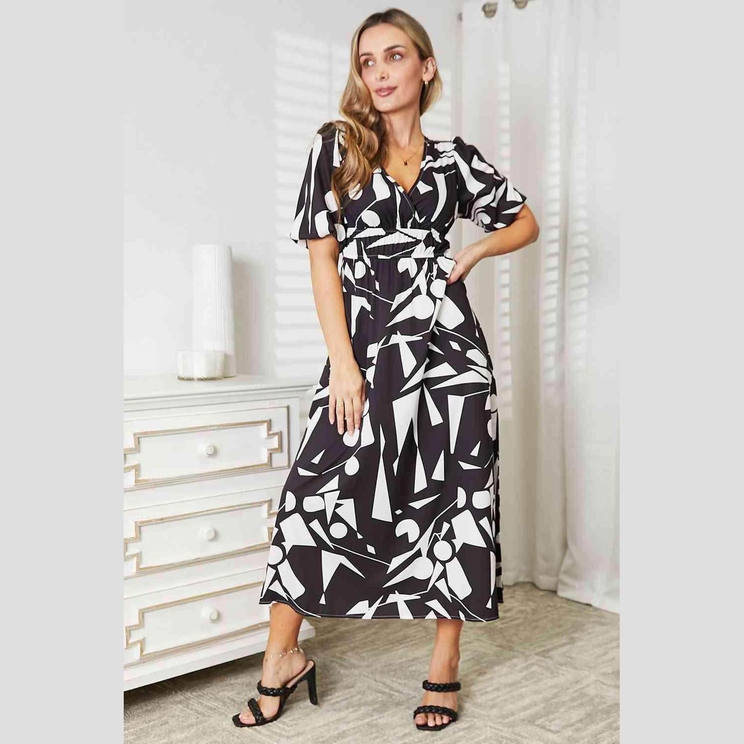 Trendsi balloon sleeve vacation dress featuring a geometric print and a flattering fit for summer outings