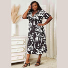 Trendsi women's balloon sleeve vacation dress in black and white geometric print, perfect for summer outings