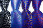 VacationGrabs black orange dot tie featuring a unique pattern for stylish formal wear
