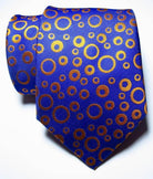 Stylish black orange dot tie designed with vibrant circular patterns for fashionable men's accessories