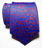 Men's black orange dot tie by VacationGrabs, featuring a bold pattern on a vibrant background
