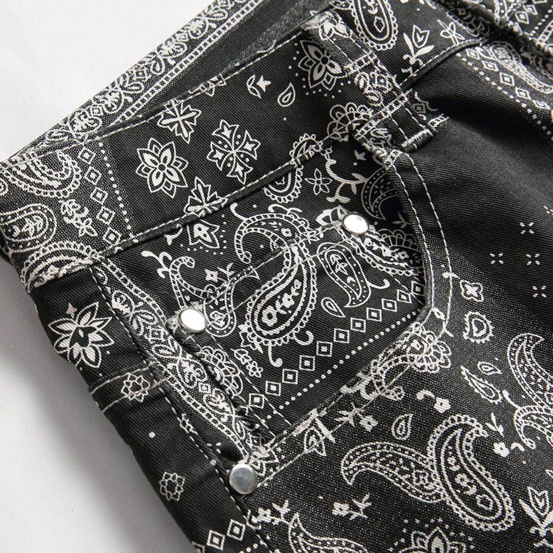 Close-up of black printed jeans for men featuring intricate pattern details and stylish design