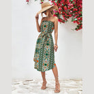 Trendsi boho style strapless dress with vibrant floral patterns and a chic tie waist