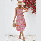 Trendsi boho style strapless dress with colorful patterns and a tie waist for summer outings