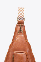 Stylish brown sling bag featuring a geometric strap, perfect for everyday use and casual outings