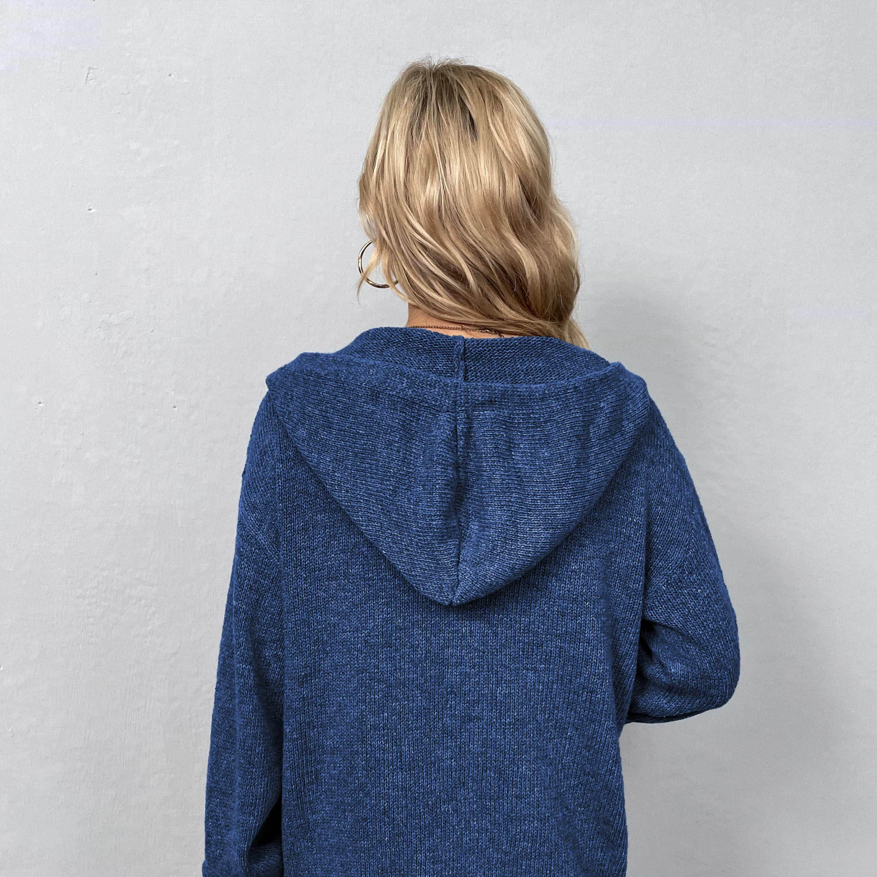 Back view of a blue casual hooded cardigan for women, perfect for comfortable layering