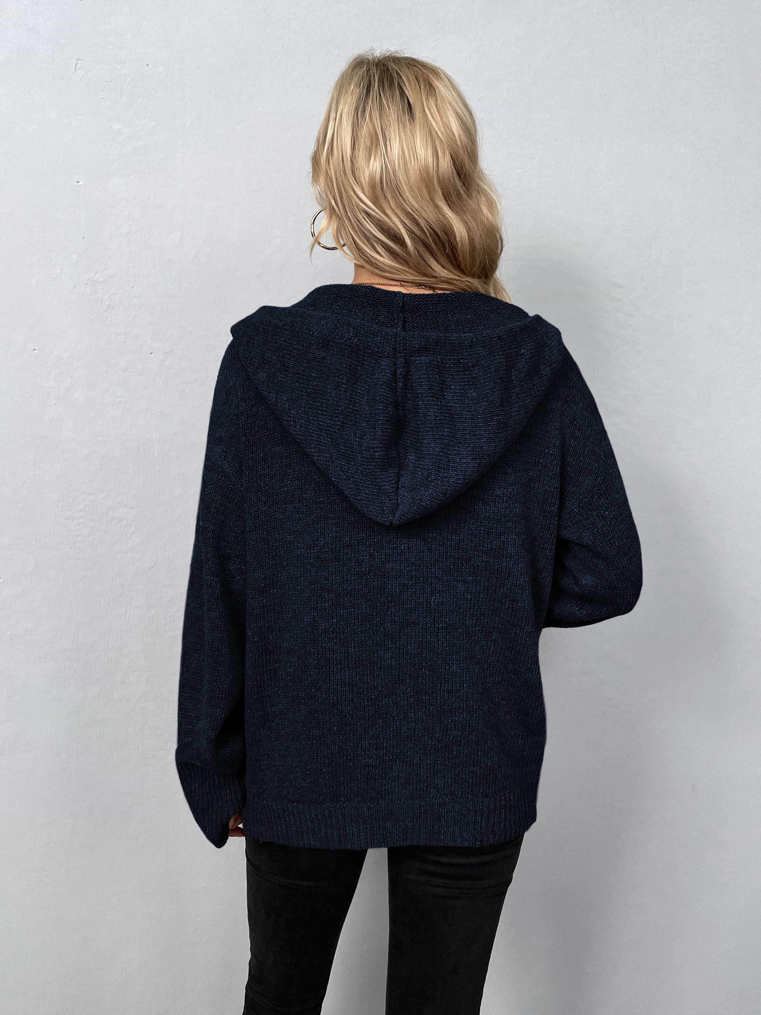 Back view of a casual hooded cardigan in navy blue, perfect for everyday outfits