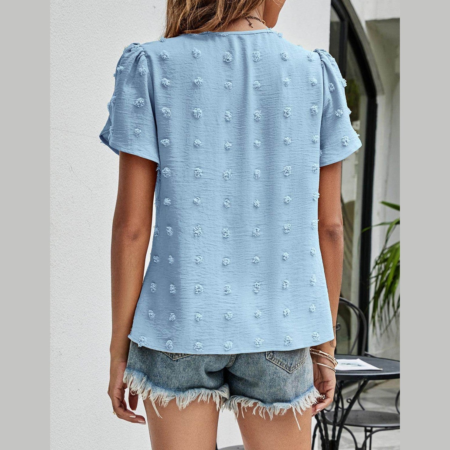 Trendsi women's casual pink Swiss dot top with playful texture and short sleeves