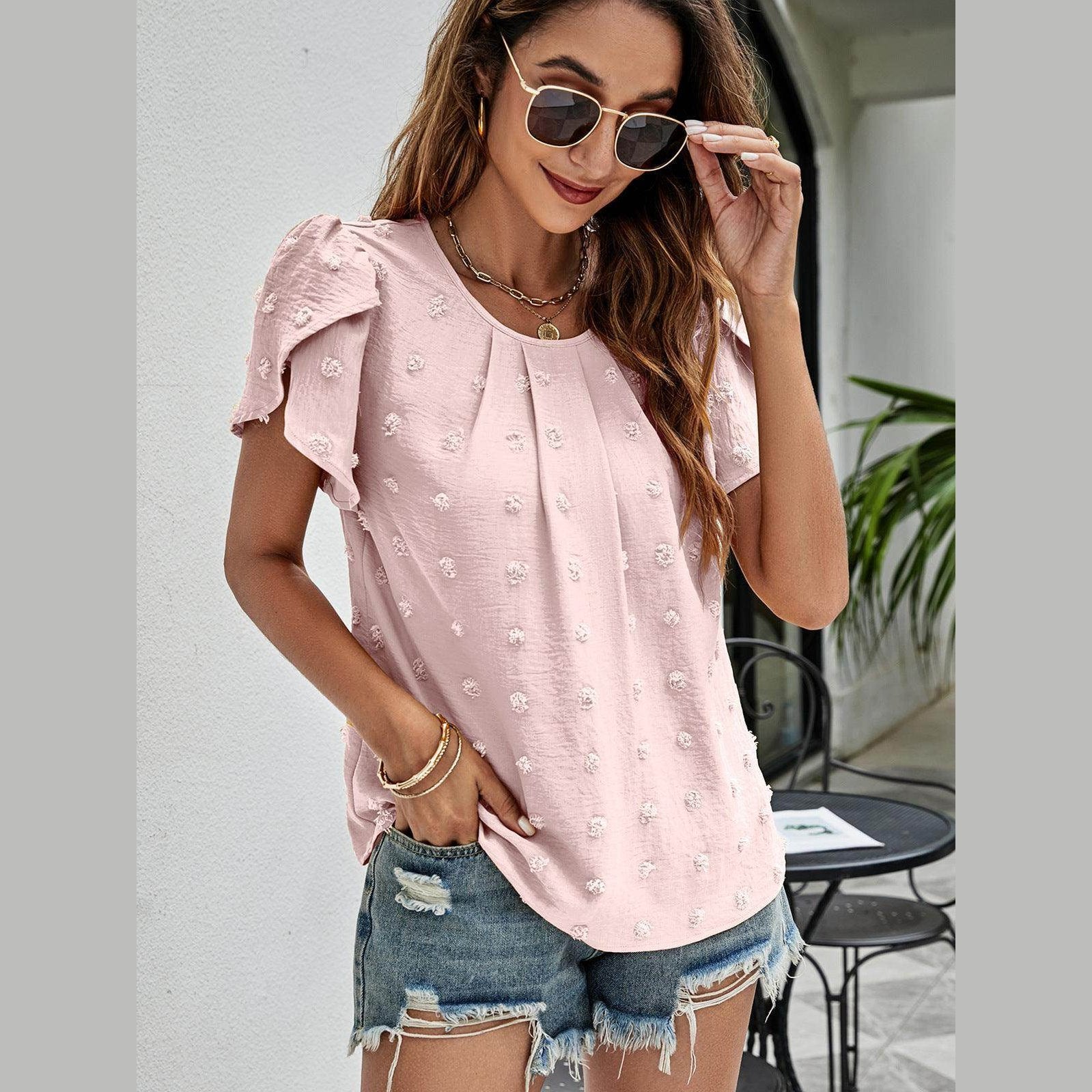 Trendsi casual pink Swiss dot top featuring short puff sleeves and textured fabric for a stylish look