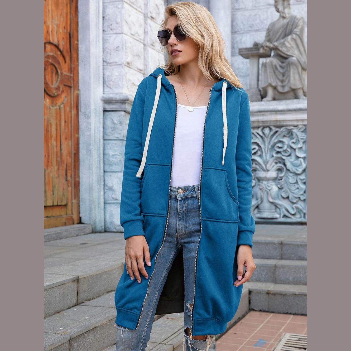 Trendsi casual travel hoodie in blue with a long design and front zipper, perfect for stylish comfort