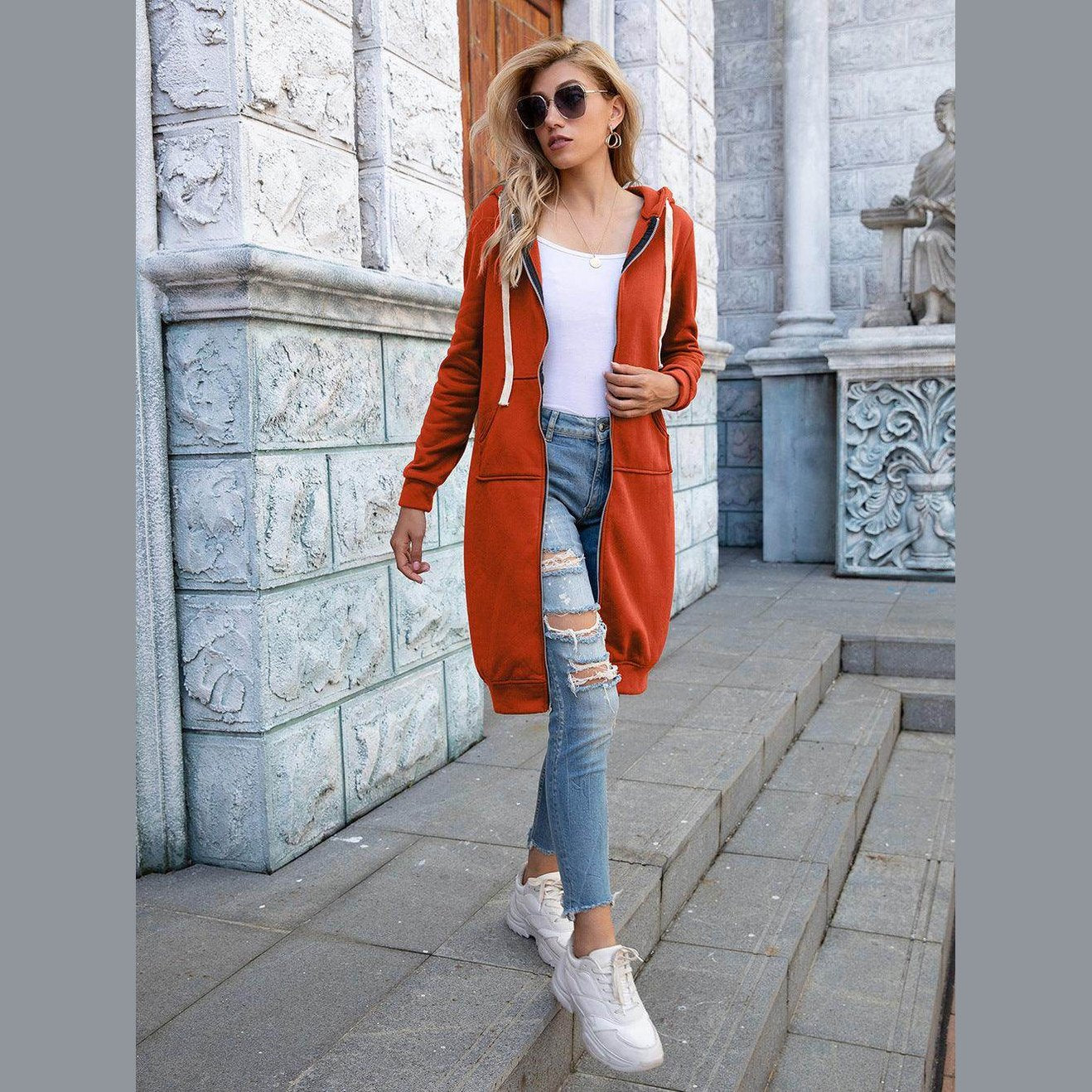 Trendsi women's casual travel hoodie in orange with pockets and long sleeves, perfect for stylish outdoor outings