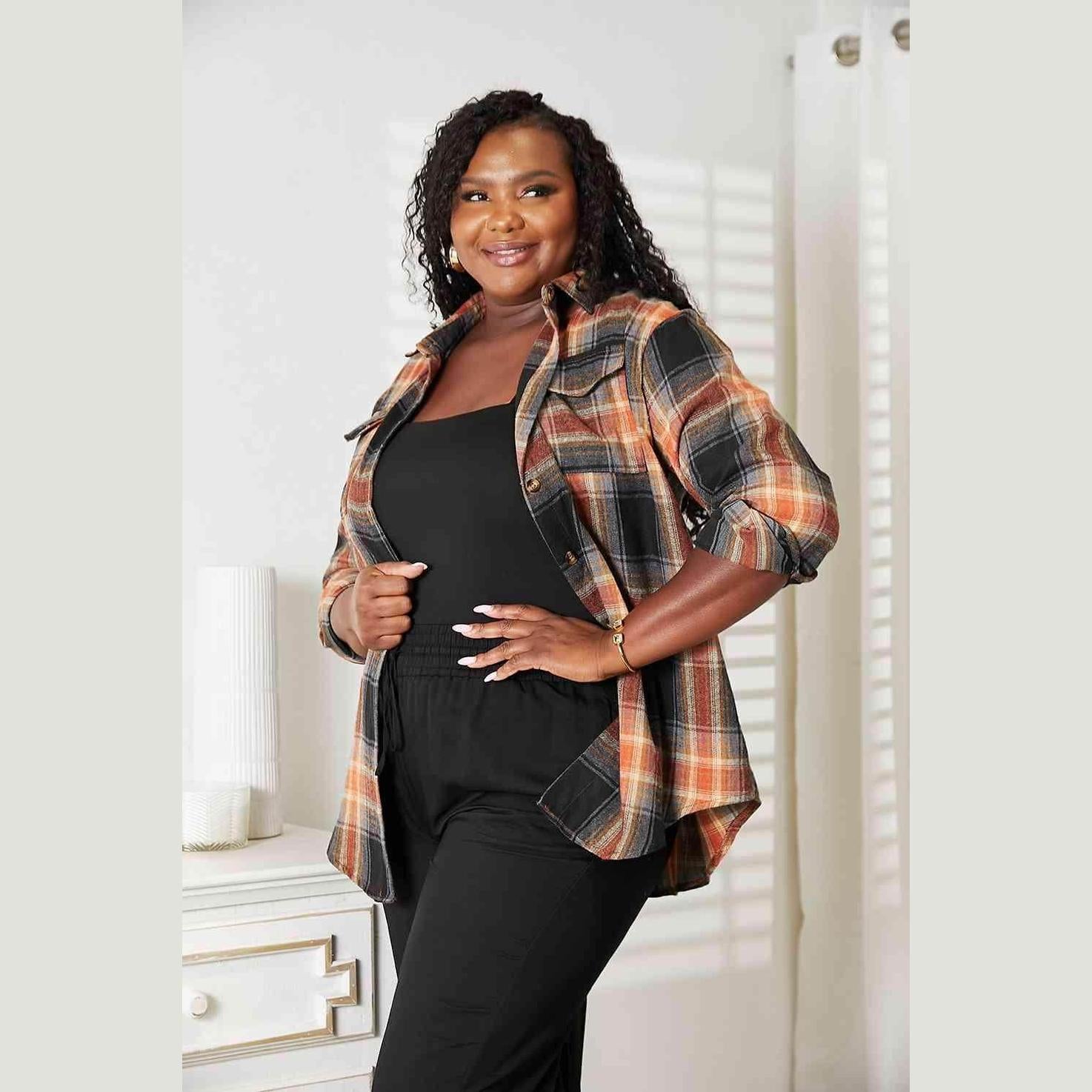 Plus size women's casual vacation shirt in plaid design, perfect for relaxed outings and travel