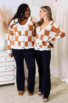 Women wearing a checkered pattern sweater cardigan in orange and white with button details