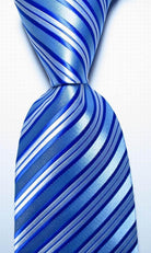 Colorful striped silk neckties in shades of blue with a shiny finish for formal occasions