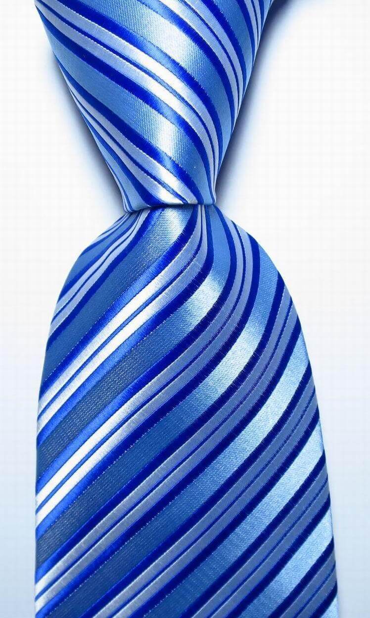 Colorful striped silk neckties in shades of blue with a shiny finish for formal occasions