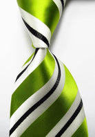 Colorful striped silk neckties in green and white with black accents for a stylish look