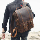 Man wearing a crazy horse leather daypack with adjustable straps, perfect for daily adventures