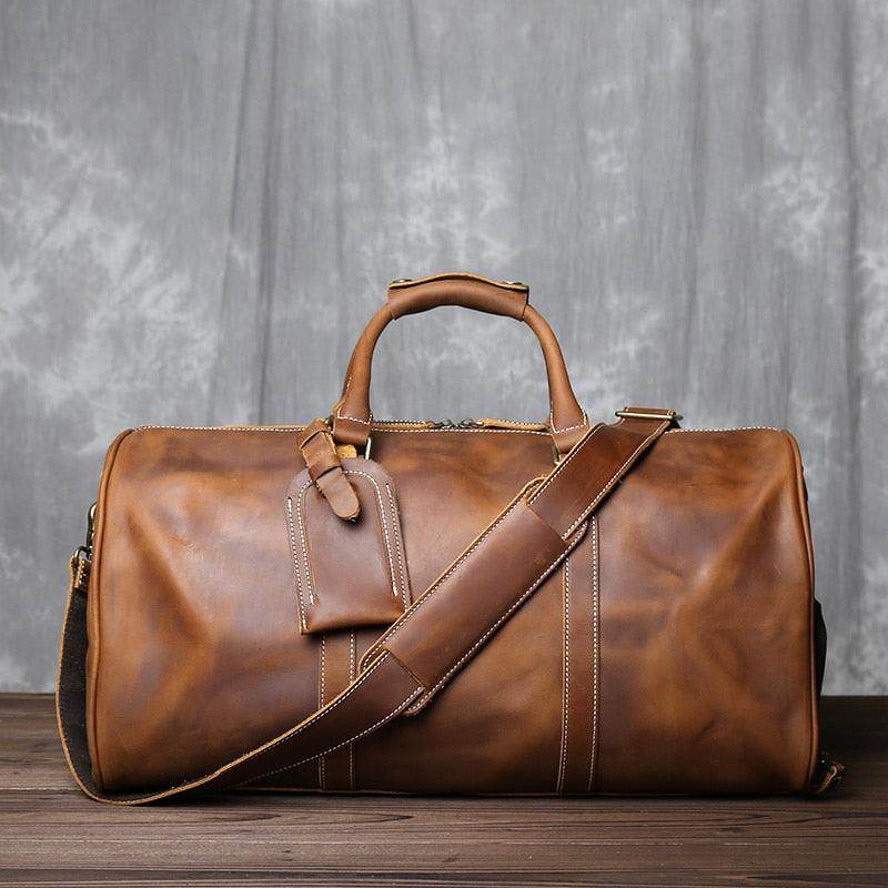 Crazy horse leather travel bag with durable handles and adjustable strap for stylish trips