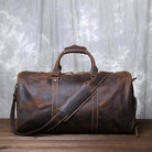 Stylish crazy horse leather travel bag with sturdy handles and detachable shoulder strap