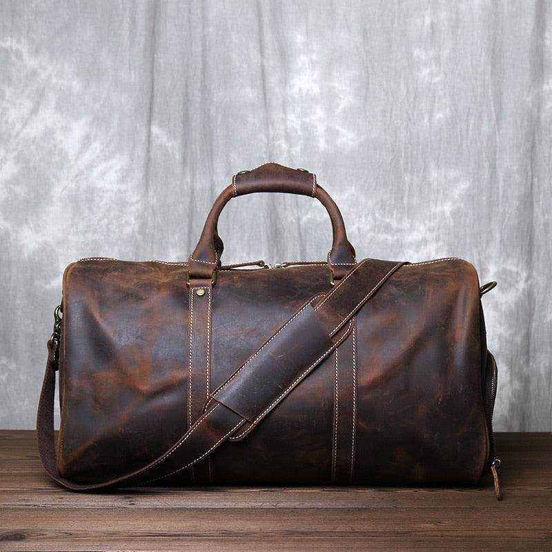 Stylish crazy horse leather travel bag with sturdy handles and detachable shoulder strap