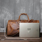 Crazy horse leather travel bag by VacationGrabs shown next to a 13-inch laptop for size comparison