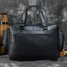 Elegant designer leather laptop briefcase with dual handles and exterior zipper pockets