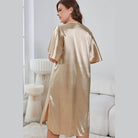 Elegant nightwear for women in gold satin with short sleeves and side slits for comfortable lounging
