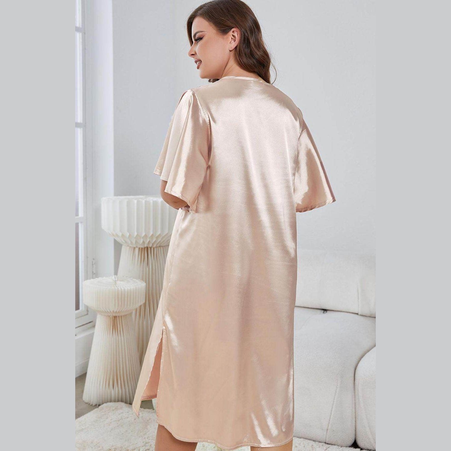Elegant nightwear for women featuring a soft satin finish and stylish split hem design
