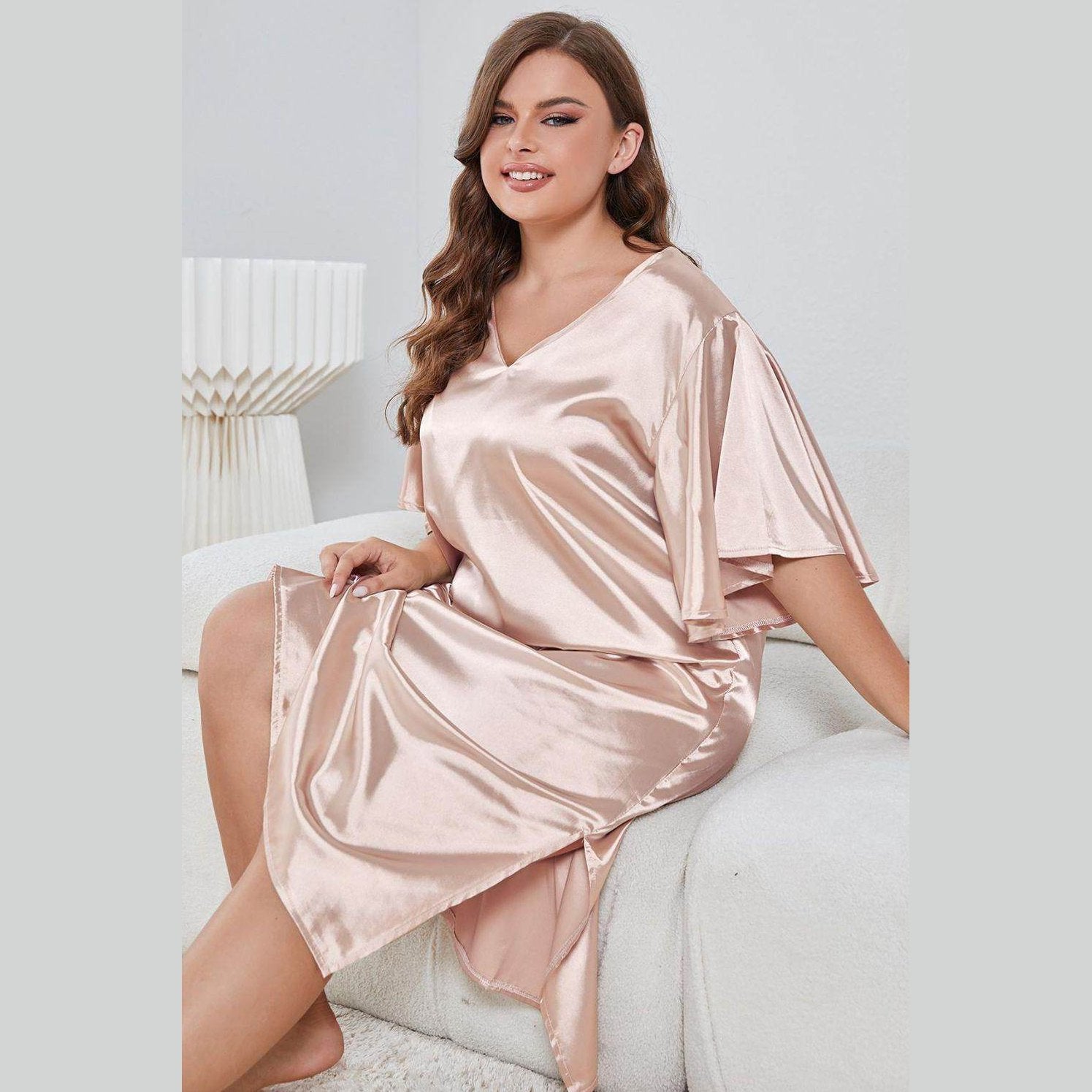 Trendsi elegant nightwear for women, featuring a soft pink satin robe with flutter sleeves for luxurious comfort.