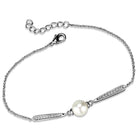 Elegant rhodium chain bracelet featuring a central pearl and sparkling accents for sophisticated style