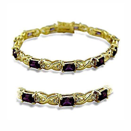 Elegant vacation jewelry for women featuring a gold bracelet with purple stones and sparkling accents