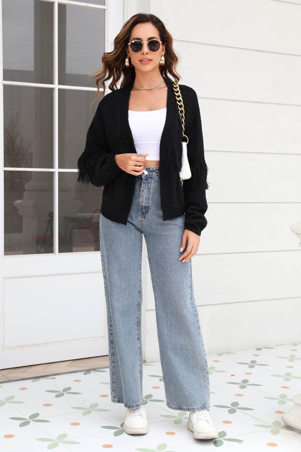 Trendsi women's fringe trim cardigan in black paired with wide-leg jeans for a stylish look