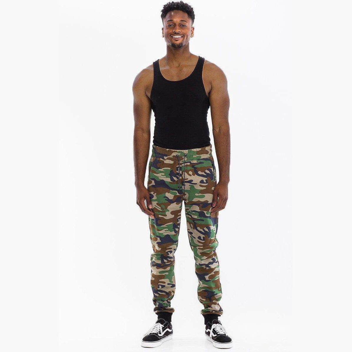 Men's green brown camo sweatpants from VacationGrabs with elastic waistband and cuffed ankles
