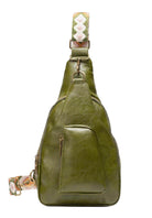 Stylish green sling bag with a unique strap design, perfect for casual outings and daily use