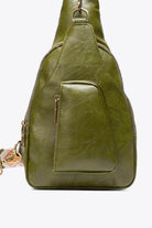 Stylish green sling bag with side pocket and adjustable strap for trendy outings
