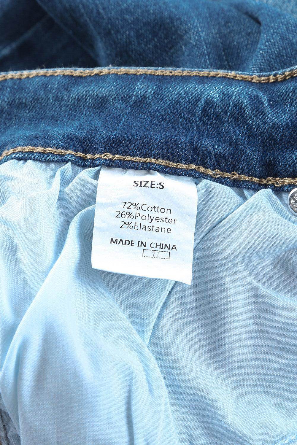 Label of VacationGrabs high rise flare jeans showing fabric composition and size details