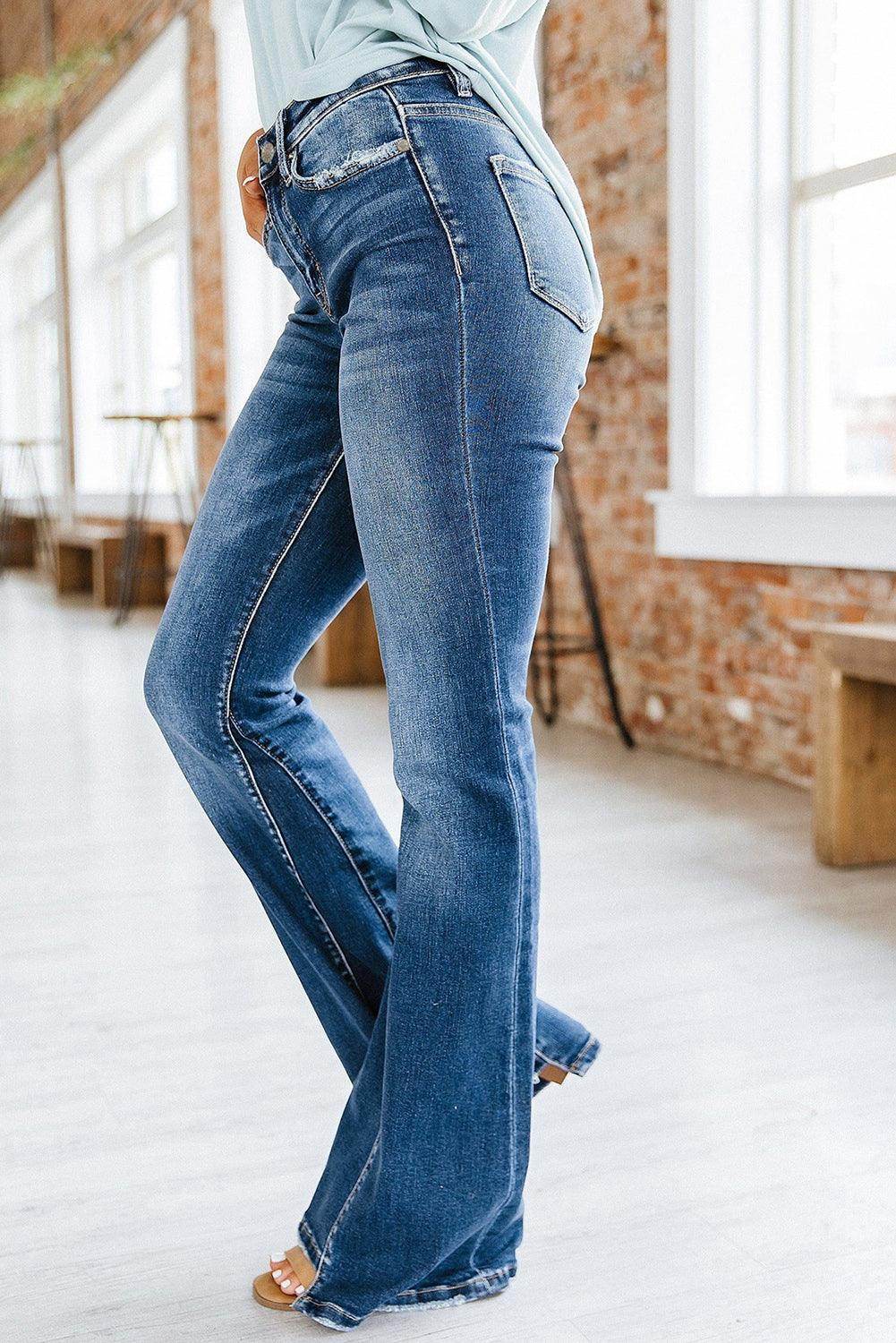 VacationGrabs high rise flare jeans in blue denim for a stylish and comfortable fit