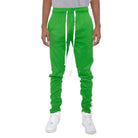 Men in Kelly Green Slim Track Pants with Elastic Waist and White Drawstring for Comfortable Fit
