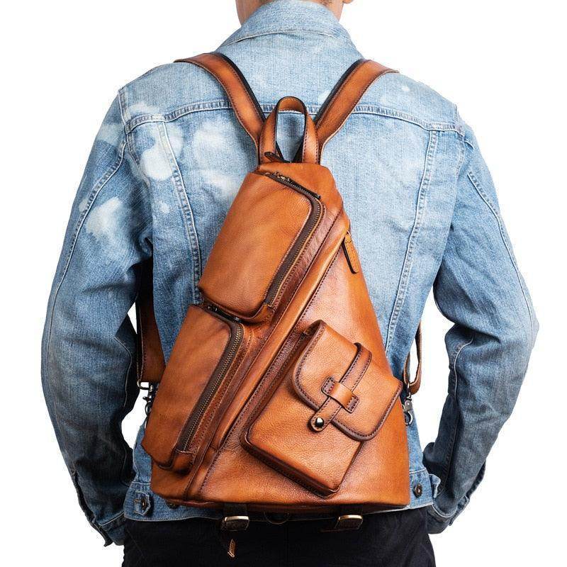 VacationGrabs leather shoulder backpack men in brown with multiple pockets and adjustable straps