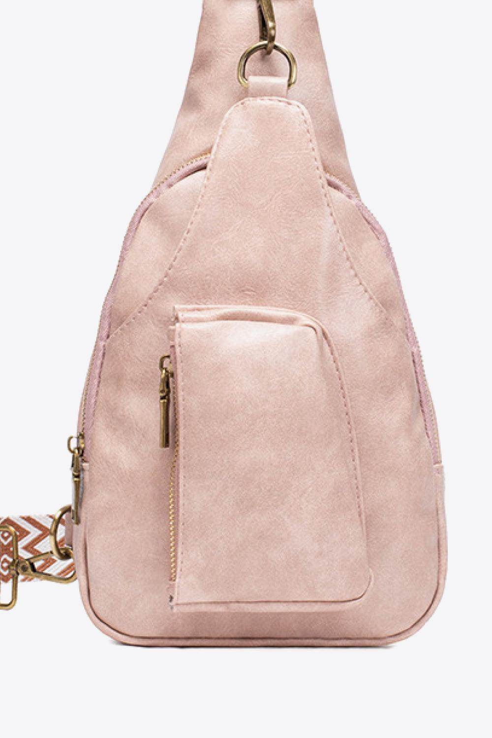 Trendsi pink PU leather sling bag with a stylish design and front zip pocket for easy access