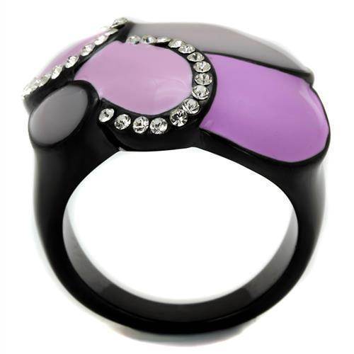 Stylish light purple crystal ring featuring black accents and sparkling embellishments